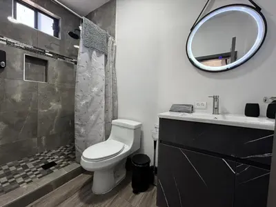 Un baño de Departamento LUNA