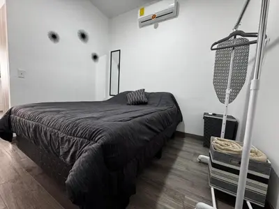 Cama o camas de una habitación en Departamento LUNA