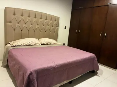 Cama o camas de una habitación en Depa Frente al Parque Central, Excelente Ubicacion