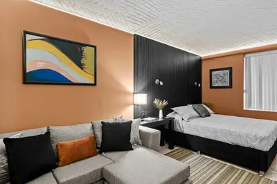 Cama o camas de una habitación en Historic Center Loft with AC and Private Parking