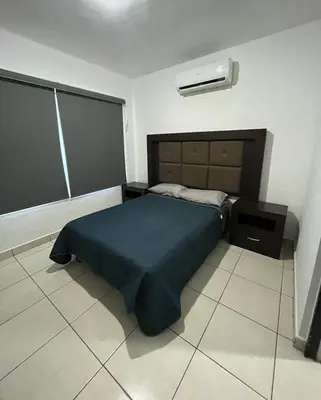 Cama o camas de una habitación en Casa de Relajación