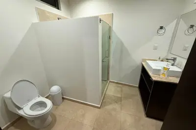 Un baño de Departamento frente al mar en Playa Brujas