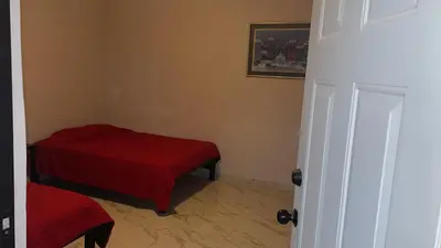 Cama o camas de una habitación en Hospedajes Evelin