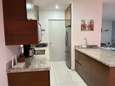 Una cocina o zona de cocina en Departamento en privada en Mazatlan, con alberca