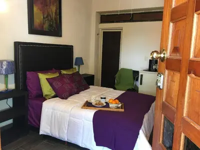 Cama o camas de una habitación en Nice air-conditioned studio in a magical village