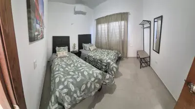 Cama o camas de una habitación en casa estefania