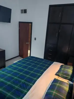 Cama o camas de una habitación en Comfortable house 15 min Consulate 10 min Bridge