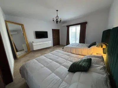 Cama o camas de una habitación en Casa María, Elegant Modern Retreat with Private Pool