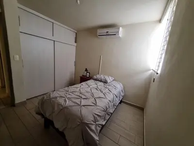 Cama o camas de una habitación en Casa centrica y acogedora para tu visita a Hermosillo