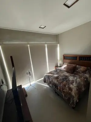 Cama o camas de una habitación en Departamento en Mazatlán con alberca