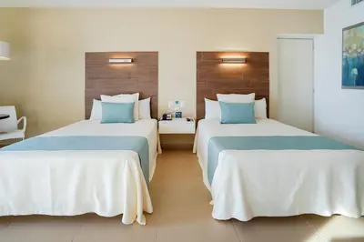 Cama o camas de una habitación en Pacific Palace Beach Tower Hotel