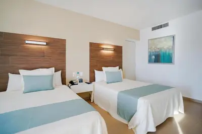 Cama o camas de una habitación en Pacific Palace Beach Tower Hotel