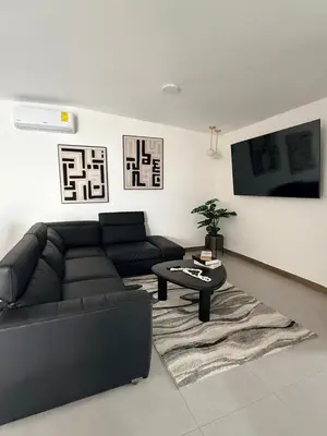 Una televisión o centro de entretenimiento en Casa Romaoc - Casa moderna en Residencial Campestre