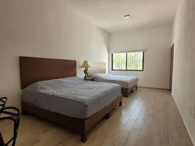 Cama o camas de una habitación en Residencial Hacienda del Márquez