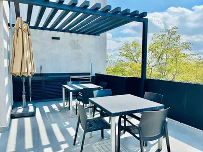Un balcón o terraza de Cerca de la Playa, Alberca en el Roof con Asador
