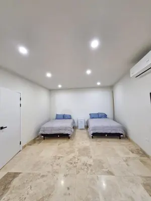 Cama o camas de una habitación en Casa de Piedra Ranchitos