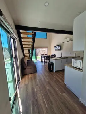 Una cocina o zona de cocina en Casa de Piedra Ranchitos