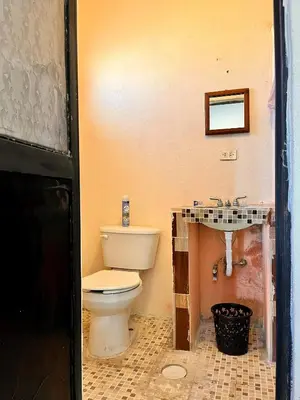 Un baño de Habitaciónes Las Palmeras