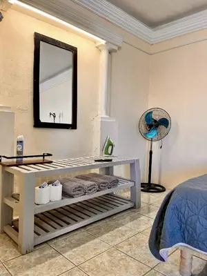 Cama o camas de una habitación en Habitaciónes Las Palmeras