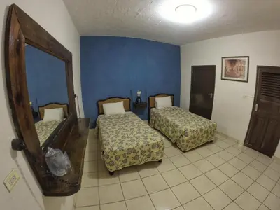 Cama o camas de una habitación en Hacienda Santa Cruz Del Fuerte