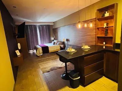 Cama o camas de una habitación en Loft moderno y acogedor