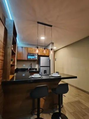 Una cocina o zona de cocina en Loft moderno y acogedor
