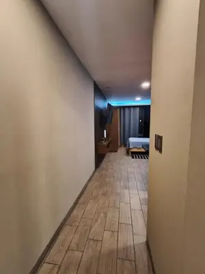 Cama o camas de una habitación en Loft moderno y acogedor
