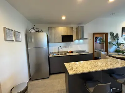 Una cocina o zona de cocina en Departamento en Mazatlán en Zona Dorada