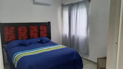 Cama o camas de una habitación en Spacious house near the beach