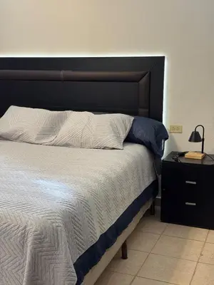 Cama o camas de una habitación en Departamento Equipado - check-in Autonomo - breakfast kit