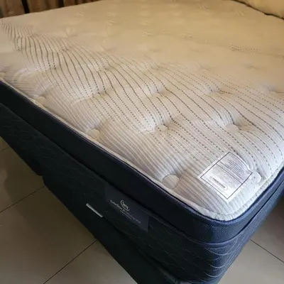 Cama o camas de una habitación en hotel villa del sol chihuahua
