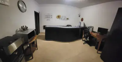 Una televisión o centro de entretenimiento en hotel villa del sol chihuahua