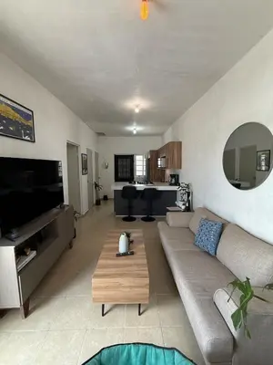 Una televisión o centro de entretenimiento en Casa en Fraccionamiento con check-in 24 hr
