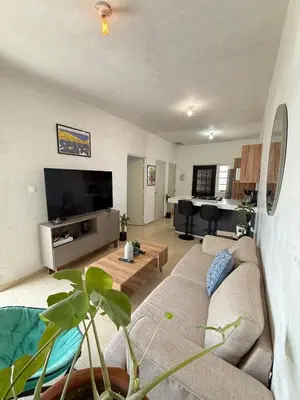 Una televisión o centro de entretenimiento en Casa en Fraccionamiento con check-in 24 hr
