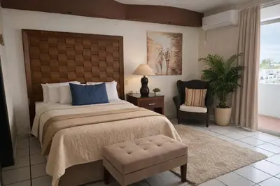 Cama o camas de una habitación en Zona Dorada Living