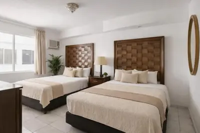 Cama o camas de una habitación en Zona Dorada Living