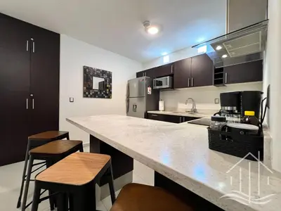 Una cocina o zona de cocina en Promo-2BR-Sleeps 8-Luxe Dept-1 Min Walk to Beach