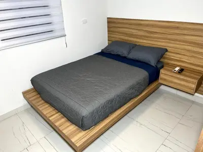 Cama o camas de una habitación en Garmendia1 New Downtown Ground Floor Apartment