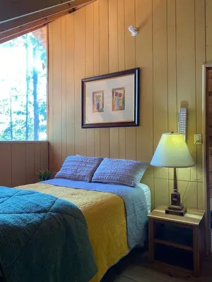 Cama o camas de una habitación en Cabañas El Ensueño