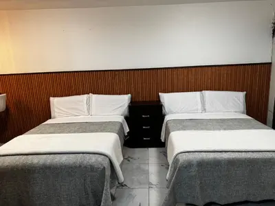 Cama o camas de una habitación en Depto para 5 cerca de aeropuerto Cocina amplia AC