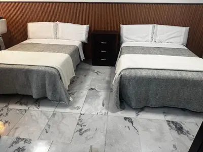 Cama o camas de una habitación en Depto para 5 cerca de aeropuerto Cocina amplia AC