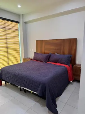 Cama o camas de una habitación en Departamento San Lorenzo #102