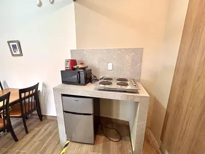 Una cocina o zona de cocina en Habitacion olas altas