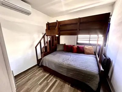 Cama o camas de una habitación en Azul Pacifico Amplia casa familiar para disfrutar
