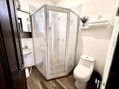 Un baño de Azul Pacifico Amplia casa familiar para disfrutar