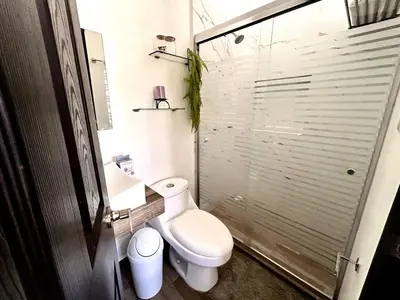 Un baño de Azul Pacifico Amplia casa familiar para disfrutar