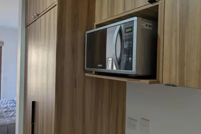 Una televisión o centro de entretenimiento en Oceanna 333 Hermoso departamento en cerritos
