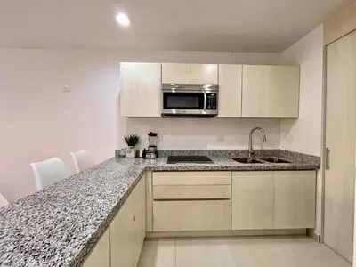 Una cocina o zona de cocina en Oceanna. Acogedor departamento a pasos de la playa