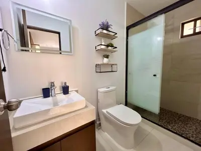 Un baño de Oceanna. Acogedor departamento a pasos de la playa