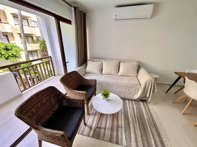 Zona de estar de Oceanna. Acogedor departamento a pasos de la playa